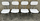 Table formica blanche, ses 4 chaises et ses deux tabourets, vintage années 70.