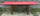 Table formica, bois massif et rouge / rose, années 50