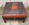 Table basse vintage en bois massif et rotin noir rainuré – tiroir central – style colonial vintage, années 70 / 80