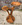 Guéridon porte-plantes Art déco à 3 plateaux – chêne cintré, élégance 1930