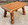 Petit tabouret bas en chêne massif – Pieds bobines sculptés style brutaliste années 1950-1960