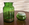 Bocal apothicaire en verre vert émeraude à décor doré – Belgique années 1960-1970
