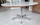 Table ovale Roche Bobois, esprit Florence Knoll, laminé blanc et chrome, années 70