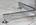 Table ovale Roche Bobois, esprit Florence Knoll, laminé blanc et chrome, années 70
