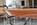 Table ovale Roche Bobois, esprit Florence Knoll, laminé blanc et chrome, années 70