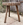Tabouret sculptural en bois brut, tranche crantée façon roue dentée, art populaire brutaliste