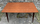 Table-pieds-effilés-compas-bois-vernis-extensible-vintage-années-50