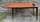 Table-pieds-effilés-compas-bois-vernis-extensible-vintage-années-50