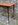 Table-pieds-effilés-compas-bois-vernis-extensible-vintage-années-50
